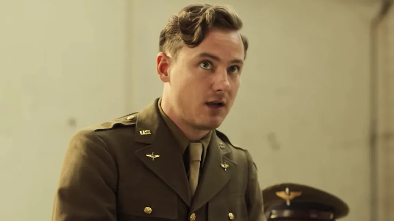 Lewis Pullman as Major Major typing in Catch-22