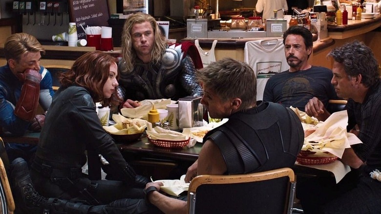 Steve Rogers (Chris Evans), Natasha Romanoff (Scarlett Johansson), Thor (Chris Hemsworth), Clint Barton (Jeremy Renner), Tony Stark (Robert Downey, Jr.), and Bruce Banner (Mark Ruffalo) eat shawarma in The Avengers