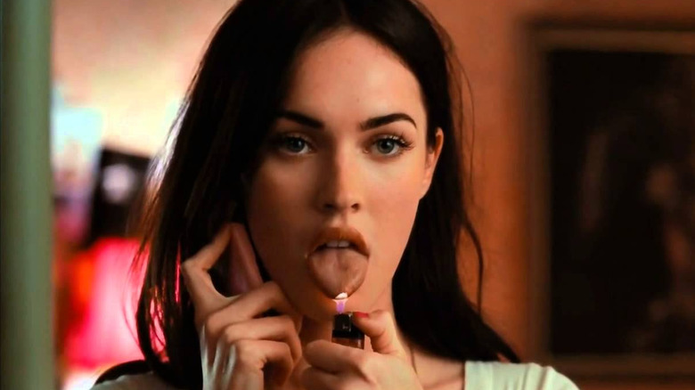 Megan Fox as Jennifer burning her tongue with lighter in Jennifer's Body