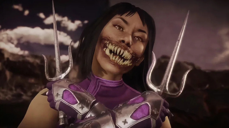 Mileena grins while holding her sai in Mortal Kombat 11