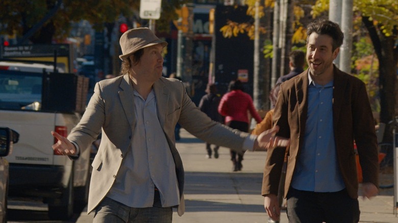 Matt Johnson and Jay McCarrol as themselves in Nirvanna the Band the Show the Movie, walking down a Toronto street.