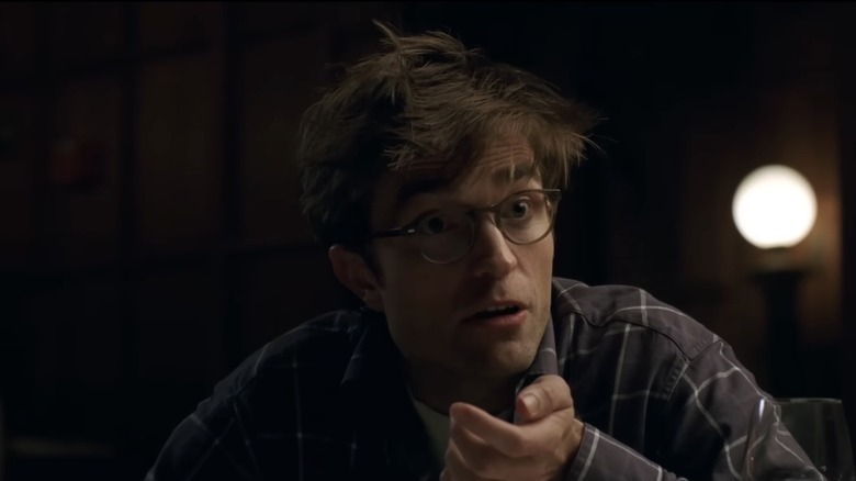 A medium shot of Robert Pattinson as Charlie in The Drama.