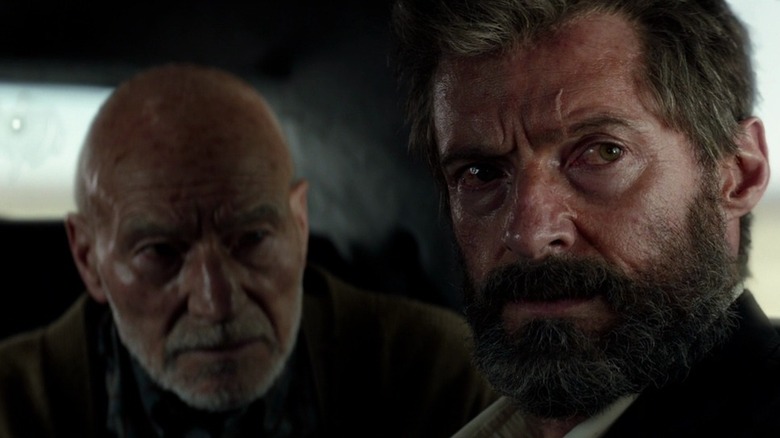 Logan (Hugh Jackman) and Charles Xavier (Patrick Stewart) looking out of a car in Logan