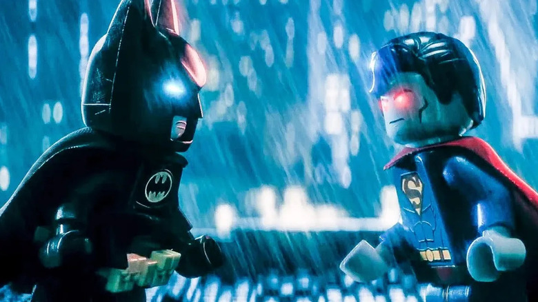 Batman (Will Arnett) staring down Superman (Channing Tatum) in The LEGO Batman Movie