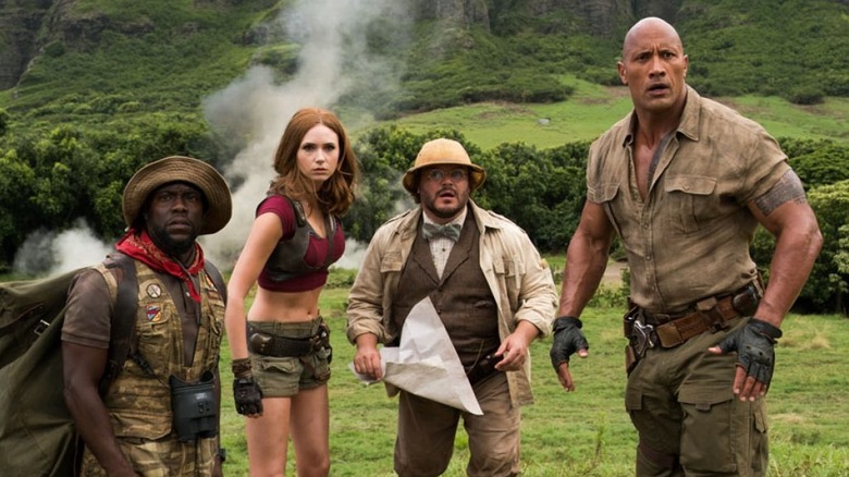 Dwayne Johnson, Kevin Hart, Karen Gillan, and Jack Black as Smolder, Franklin, Ruby, and Shelly in Jumanji: Welcome to the Jungle