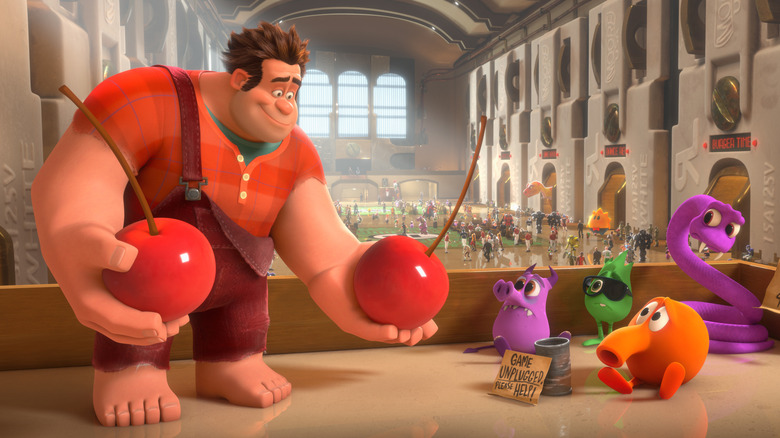 Ralph offers cherries to scared video game characters in Wreck-It Ralph