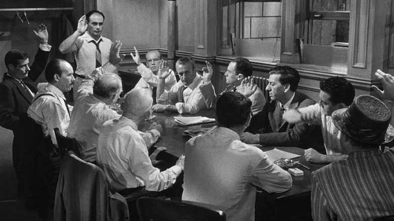 The jurors of 12 Angry Men gathered together.