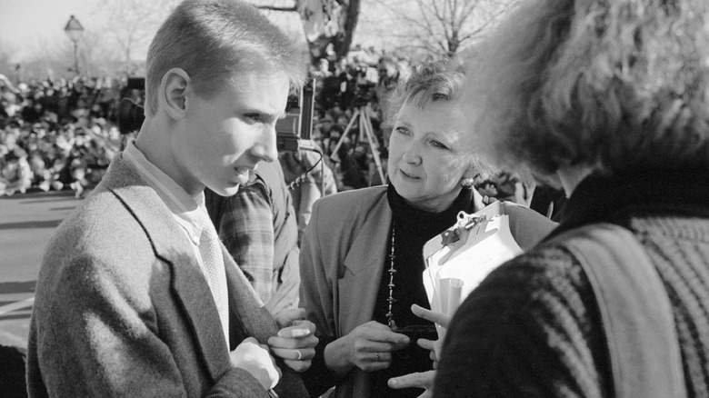 Archival image from the documentary Deaf President Now! featuring students and staff conferring about the protest at hand.