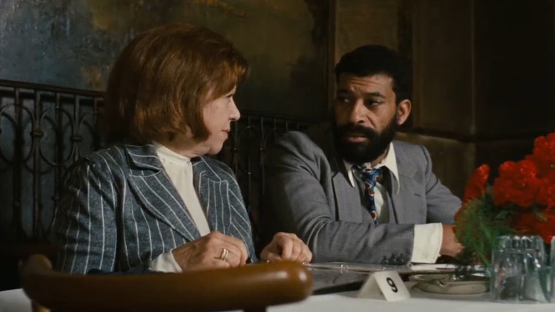 Brigitte Mira and El Hedi ben Salem as Emmi and Ali, sitting together at a dining table in Ali: Fear Eats the Soul