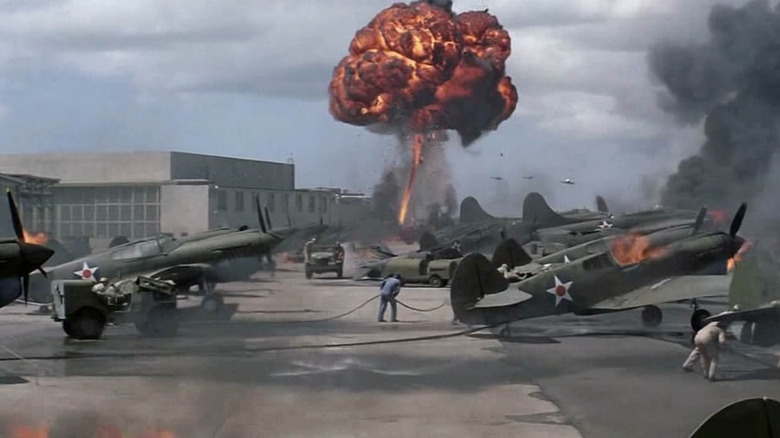 An airfield is filled with smoke and explosions in Tora! Tora! Tora!