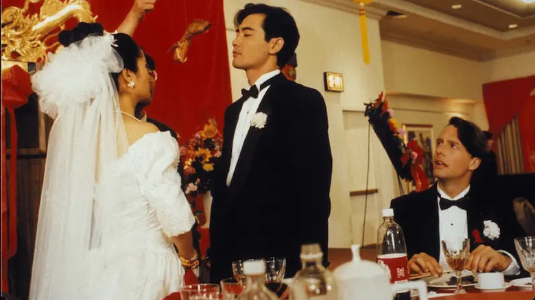 Mary Chin, Winston Chao, and Mitchell Lichtenstein as Gao Wai-Tung, Gu Wei-Wei, and Simon on Wei-Wei and Wai-Tung's fake wedding day in The Wedding Banquet