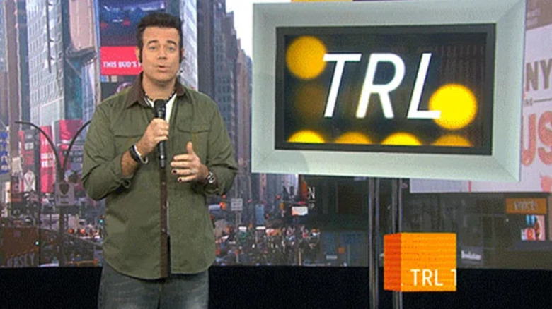 Carson Daly stands in the studio overlooking Times Square in Total Request Live