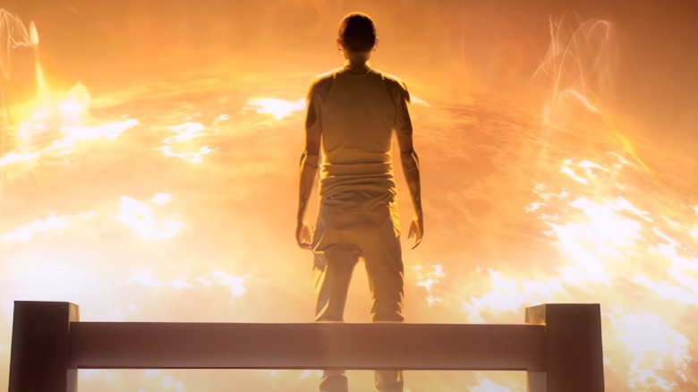 Chester Bennington staring out a spaceship window at the sun in the Leave Out All The Rest music video