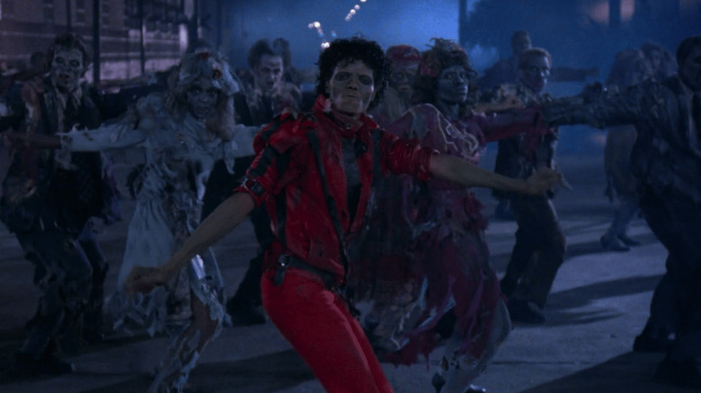 Michael Jackson as a zombie, dancing with other zombies in the Thriller music video