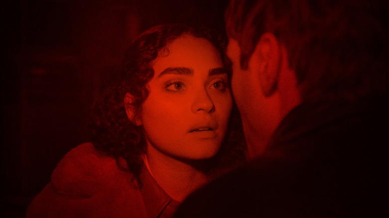 Shelby (Brittany O'Grady) in red lighting in It's What's Inside