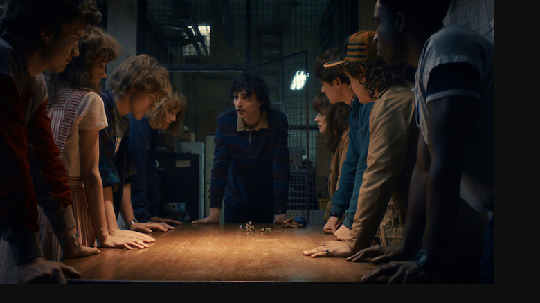 Mike tells the rest of the Hawkins heroes his battle plan in Stranger Things