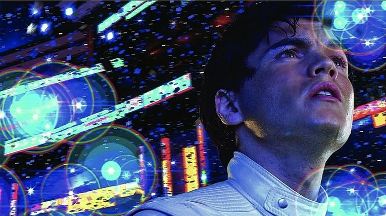 Speed Racer (Emile Hirsch) stares up at dazzling lights in Speed Racer