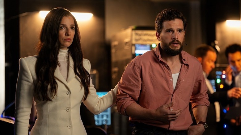 Yasmin Kara-Hanani (Marisa Abela) puts a hand on a distraught Henry Muck (Kit Harington) in Industry