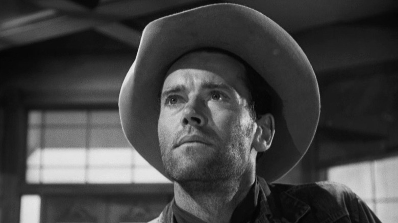 A medium shot of Henry Fonda as Gil Carter in The Ox-Bow Incident, wearing a cowboy hat.