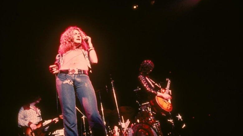 Led Zeppelin performs on stage in The Song Remains the Same