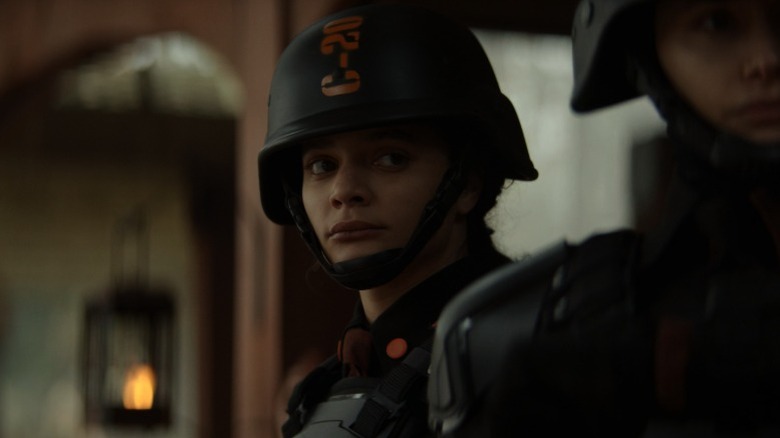 Sasha Lane as Hunter C-20 looking to her left on Loki