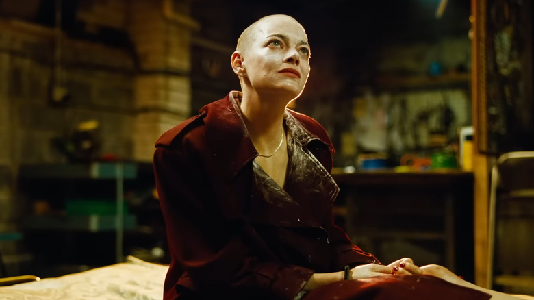 Michelle chained up in Teddy's basement in Bugonia