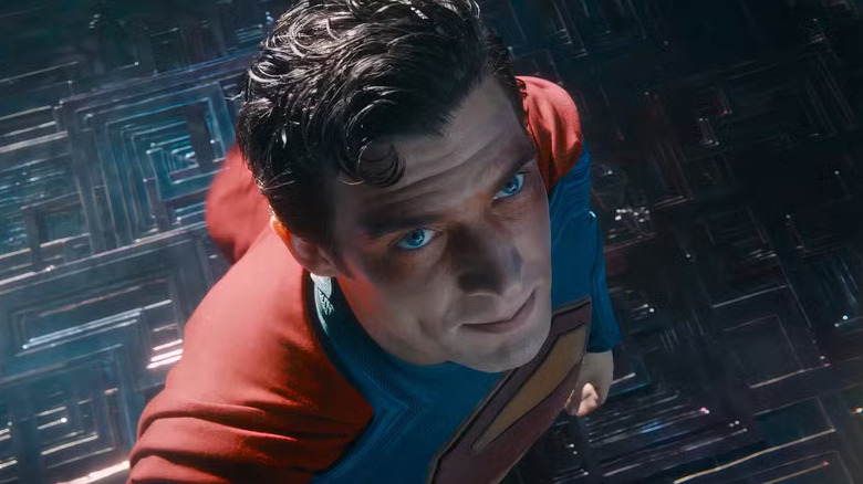 Superman (David Corenswet) looks up with sore skin around his eyes