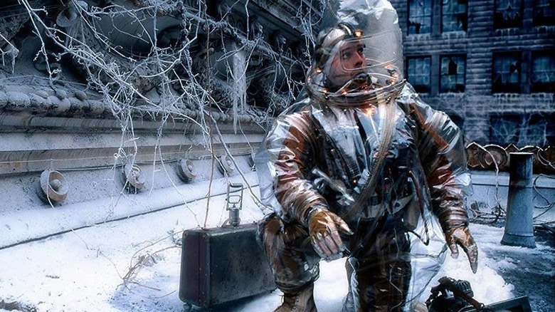 Bruce Willis as Cole, exploring a ravaged earth in 12 Monkeys