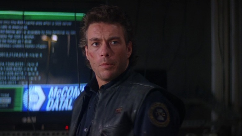 Jean-Claude Van Damme as Max, catching on to a nefarious plan in Timecop