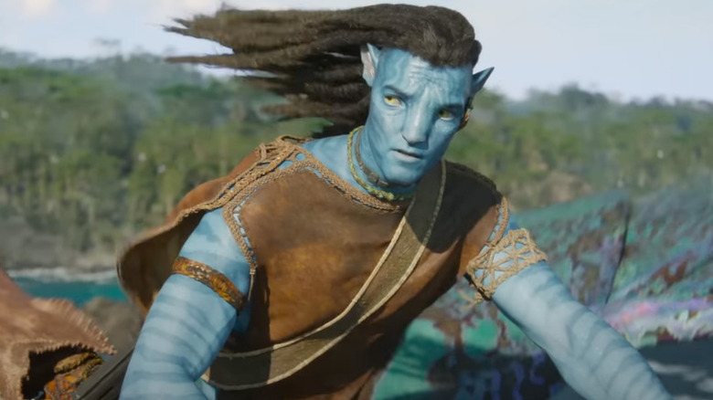 Jake Sully (Sam Worthington) rides through the air in Avatar: The Way of Water