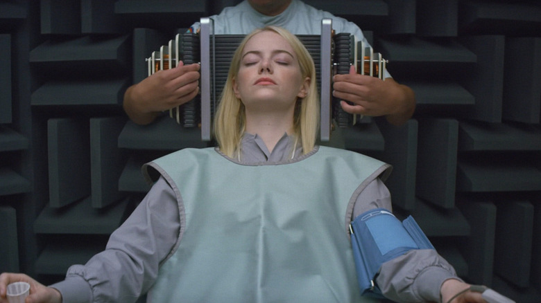 Annie Landsberg (Emma Stone) being hooked up to a chair on Maniac
