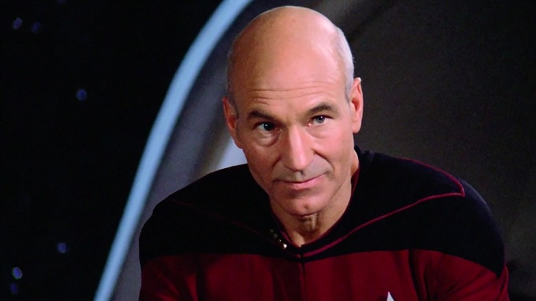 Jean-Luc Picard (Patrick Stewart) glances up in Star Trek: The Next Generation