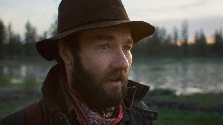 Joel Edgerton's Robert Grainier looks introspective in Train Dreams