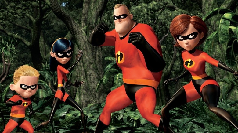 Dash Parr (Spencer Fox), Violet Parr (Sarah Vowell), Bob Parr (Craig T. Nelson), and Helen Parr (Holly Hunter) stand costumed and ready for action in The Incredibles