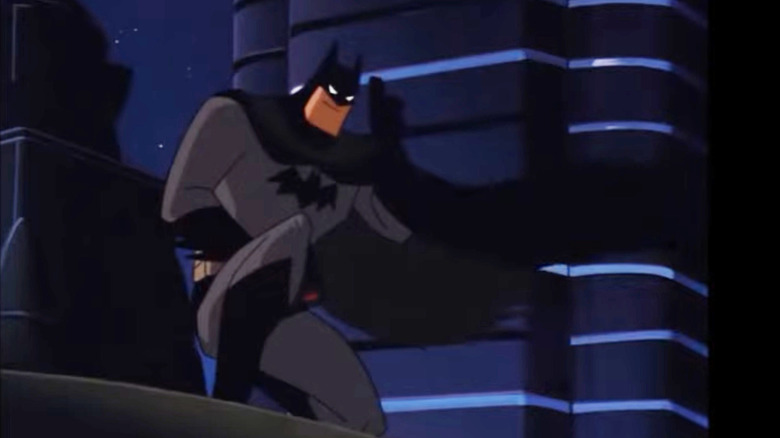 Batman salutes from a rooftop in the Batman/Superman movie