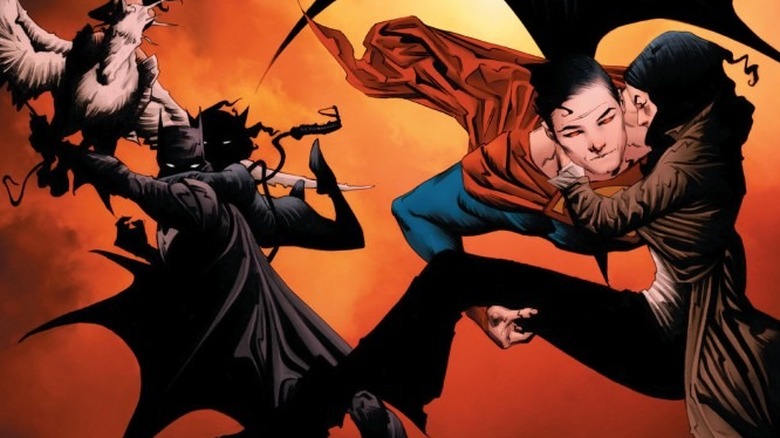 Batman and Superman saving people together