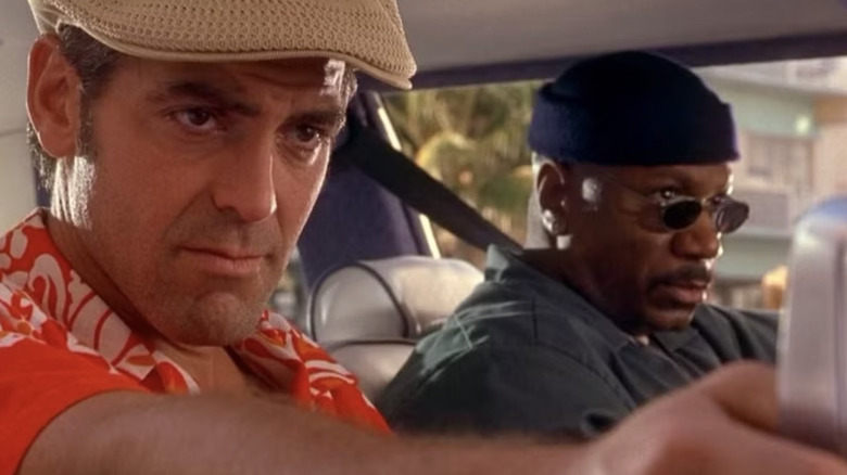 George Clooney as Jack Foley and Ving Rhames as Buddy Bragg sitting in a car in Florida in Out of Sight