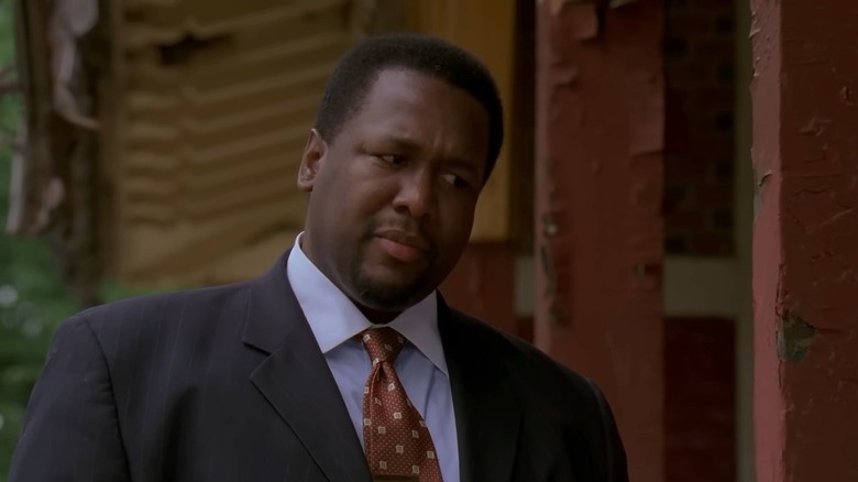 Wendell Pierce's Bunk Moreland looking down in The Wire