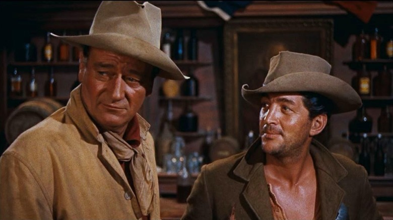 John Wayne as John and Dean Martin as Dude, taking a break in Rio Bravo