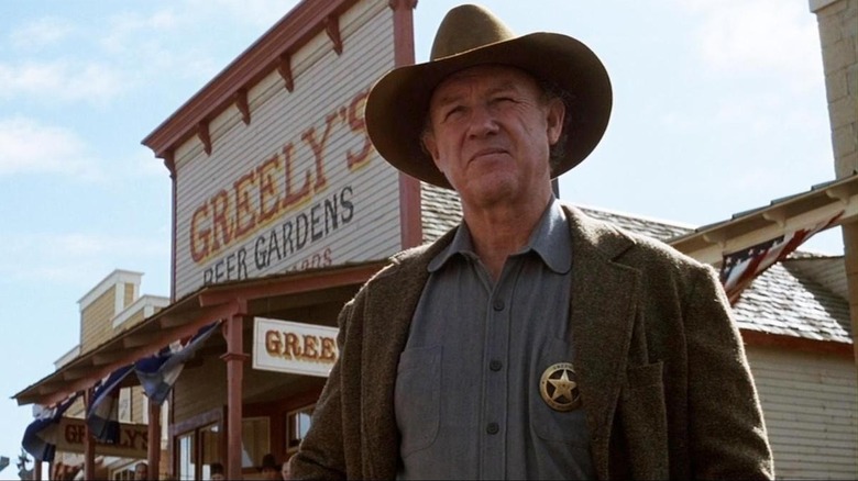 Gene Hackman as Bill, surveying his town in Unforgiven