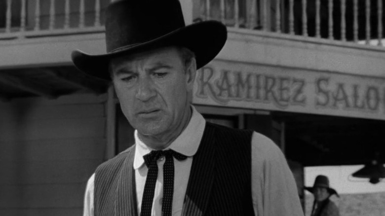 Will Kane (Gary Cooper) walks away taciturnly in High Noon