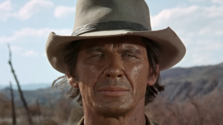 Harmonica (Charles Bronson) stares stoically ahead in Once Upon a Time in the West
