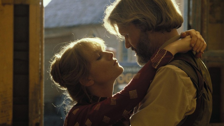 Kris Kristofferson as James and Isabelle Huppert as Ella, about to kiss in Heaven's Gate