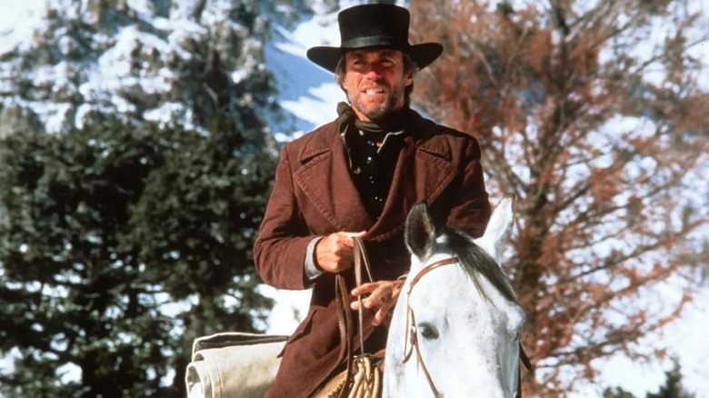 Clint Eastwood as the Preacher, riding a pale horse in Pale Rider