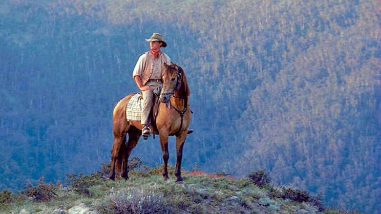 Tom Burlinson as Jim, taking in the scenery in The Man from Snowy River
