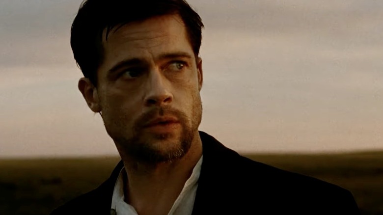 Jesse James (Brad Pitt) looks pensively in a sunset light in The Assassination of Jesse James by the Coward Robert Ford