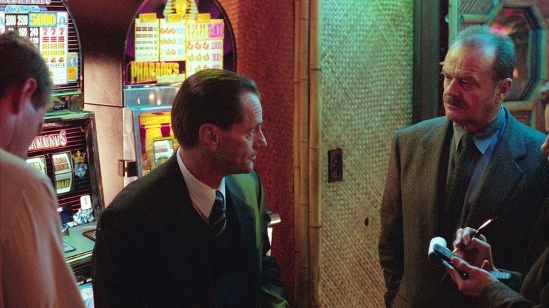 Eric Pollack (Sam Shepard) is questioned by Jerry Black (Jack Nicholson) on a casino floor in The Pledge