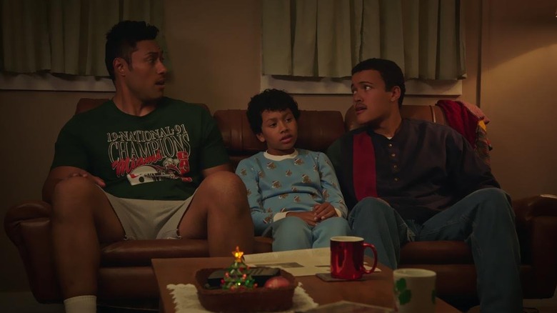 Uli Latukefu, Adrian Groulx, and Bradley Constant as three versions of Dwayne Johnson in the Young Rock Christmas Special
