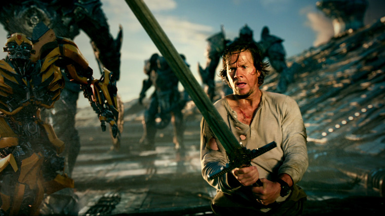 Cade (Mark Wahlberg) wields a sword in Transformers: The Last Knight