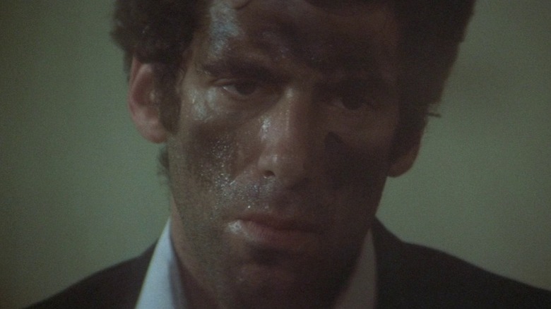 Elliot Gould looking dirty, sweaty, and downcast as Philip Marlowe in The Long Goodbye.